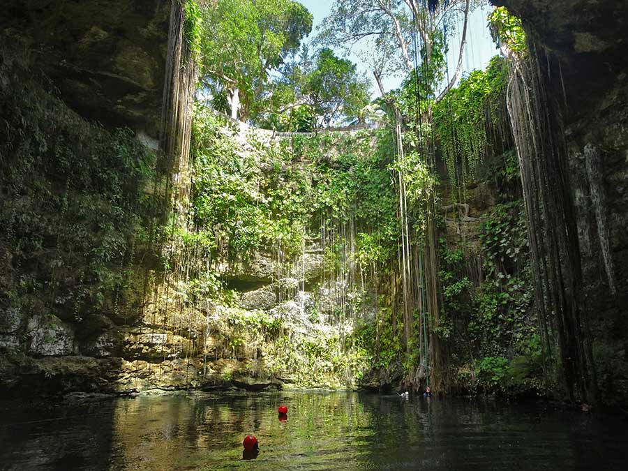 Best Cenotes in the Yucatan Cenote Ik Kil looking across the water