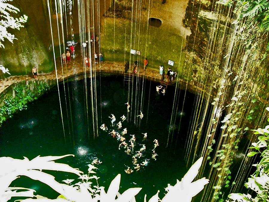 Best Cenotes in the Yucatan Cenote Ik Kil looking down on the crowds in the water