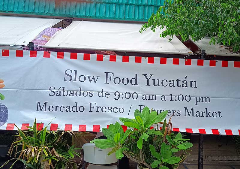 Slow food market sign