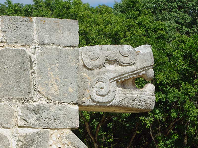 One of the Snake Head sculptures to see when visiting Chichen Itza