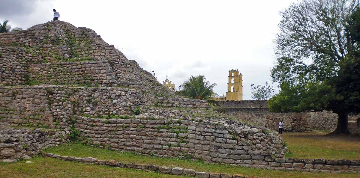 Climbing the Second Pyramid while visiting Acanceh Mayan Ruins